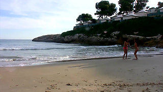 Big threesome dick sucking on the beach