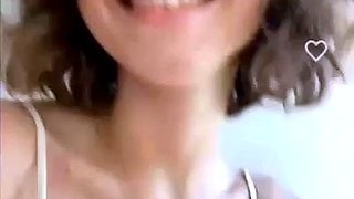 Busty curly brunette with big boobs fucks on couch