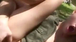 Superb babe plays with big dick next to lake
