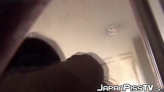Young Asian Cutie Outdoors Tied Up And Pees From The Ladders