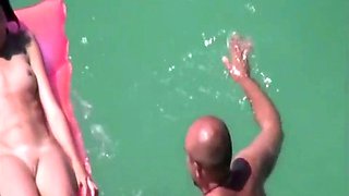 My nudist niece Emma floating in the sea (voyeur)