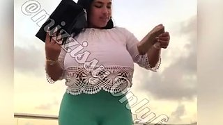 Busty curly brunette with big boobs fucks on couch