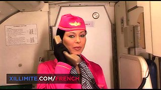 The busty stewardess takes good care of the pilot between 2 flights