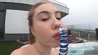 The hot brunette Lika plays with her pussy by the pool using toys