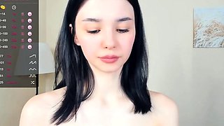 Small titted brunette Sharron with glasses masturbates