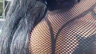 Anal queen in fishnets without panties and bra showing body