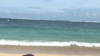 Teasing on the Beach in Micro Bikini on the Sand