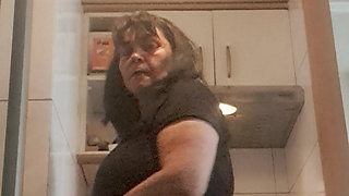 mom cleaning the floor on all fours
