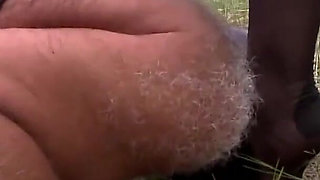 Herrin enslaves man and enjoys foot fetish outdoor