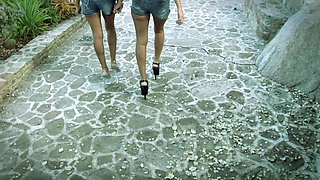 Two young sluts share a cock