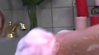 The Blonde Pussy Has Fun in the Bathtub