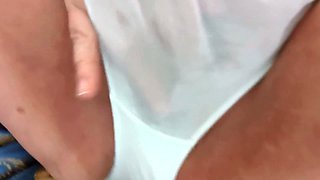 Look how the lady wets her white panties