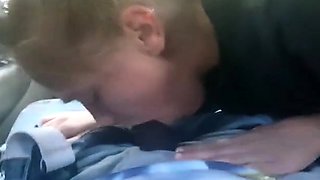 AMATEUR BLONDE SUCKING A BIG BLACK COCK IN A CAR