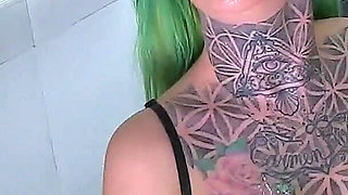 Wild Tattooed Slut Takes on a Blowbang Session Down at the Gloryhole