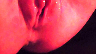 Muscular milf jerks off her big clit and pumps juice from horniness