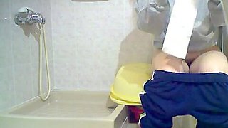 Voyeur shots of a lovely ass pissing on a toilet
