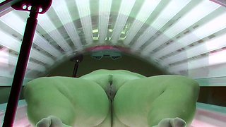 Busty and husky housewife in solarium