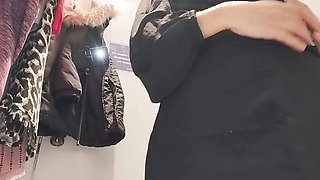 Sexy mommy Mirsur tries on some panties while eyeing a hairy milf with big tits and a big ass