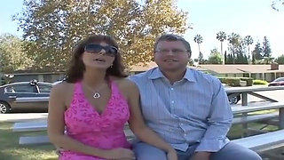 Desi Fox Is A Horny Wife glances back at her husband