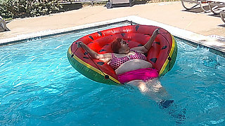 Short Video of BBW Nurse Vicki Floating on Her Huge Watermelon