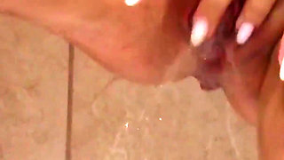 A MILF Wife Shaves Her Pussy in the Shower and Masturbates with Orgasm and Squirt. 31931
