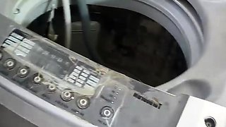 The neighbour entices me while I repair her washing machine