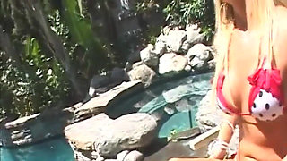 Blonde MILF Rides Big Cock Hard by the Pool