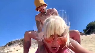 Slutty blonde girlfriend wants to fuck right in the middle of a beach