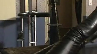 Blonde MILF humiliates masked pig