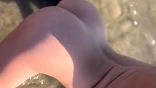 Adorable Blonde Showing Off Naked at a Public Beach