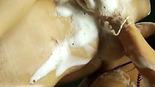 Hot esbian honeys love playing with soap and their wet pussies