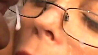 Horny MILF in stockings blows and deepthroats his BBC