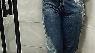 Sexy Show Getting Wet in the Shower in Clothes