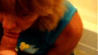 Blonde Granny Blowjob in a Bathroom