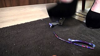 kirstin enjoy crushing a doll