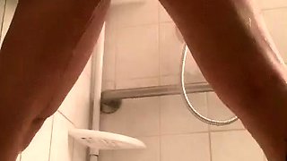 All wet in the shower with a creamy pussy