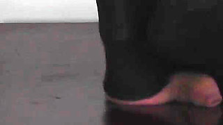 The Slave's Orgasm Under Mistress Cleo's Stocking Feet