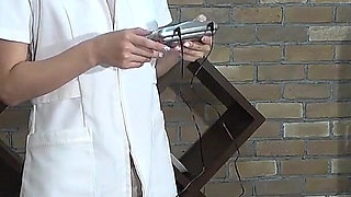 CFNM, Mischievous Esthetician Attaches Electric Current Sheet to Customer's Dick and Watches It Twitch with a Grin