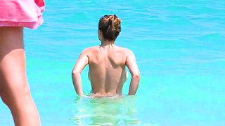 Smoothest nudist play in the warm water  at a nudist beach