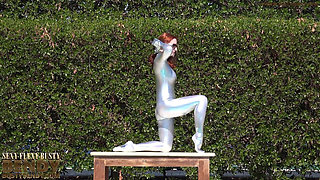 Bending in a Silver Spandex Suit