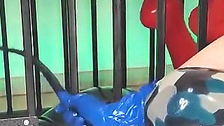 Latex Officer Fucks His Latex Prisoner with a Strap-on