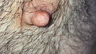 Male nipples in the foreground