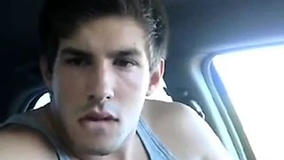 Big-cock jock strokes in his car