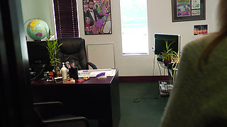 Sexy lasses kiss passionately in the office