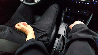 Amateur MILF gives a handjob to a taxi driver and teases him in the car, in public