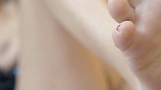 Mature Blonde MILF Teases with Glittery Stockinged Feet