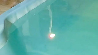 Caught in the Act! Two Brunettes Caught Masturbating in the Condo's Pool