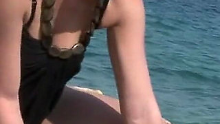 Skinny Brunette Babe Strips Naked on Beach and Fingers to Orgasm