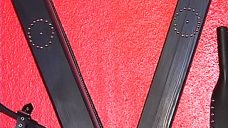 Mature Leather Domme Binds Her Fishnet Slave