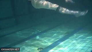 Shaved brunette sissy Irina Polcharova naked in the pool